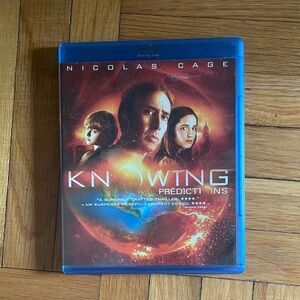 Knowing (Blu-ray) Movie - Red & Orange Cover